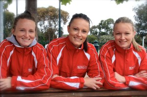 Three of a kind: The Dusting sisters, Jess, Nat and Amie, are set to clock up 1000 games for the Warrandyte Netball Club.