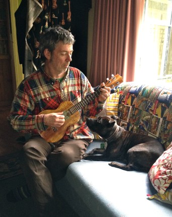 Sweet music: AJ strums a tune for a loyal fan